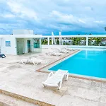 Caribbean Deluxe Ducassi Suites Studios Hotel Rooftop Pool Beach Club & Spa
