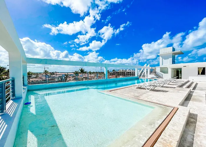 Caribbean Deluxe Ducassi Suites Studios Hotel Rooftop Pool Beach Club & Spa