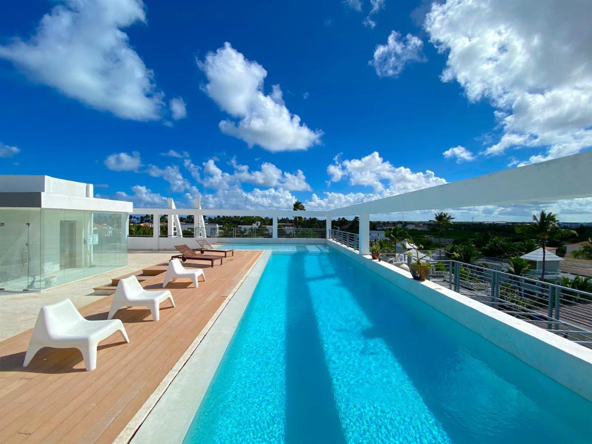Rooftop Pool Ducassi Suites - Playa Bavaro - Free Wifi & Parking - Best Location Punta Cana
