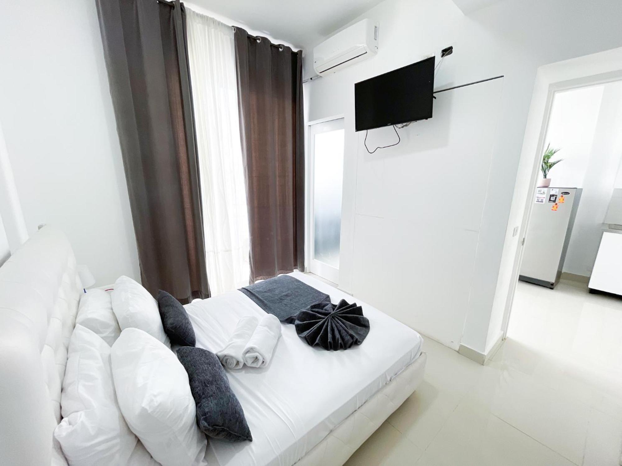 Apartamento Ducassi & Beach - Playa Bavaro - Wifi - Parking - Rooftop Pool & Spa 