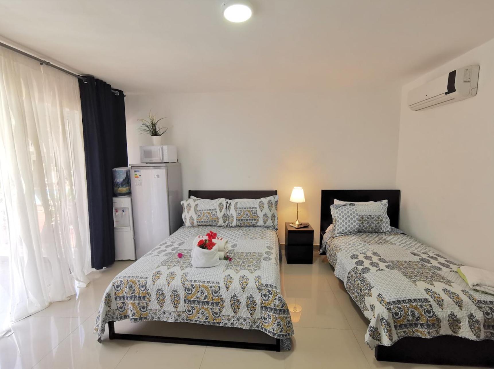 Aparthotel With Garden View And Pool Access